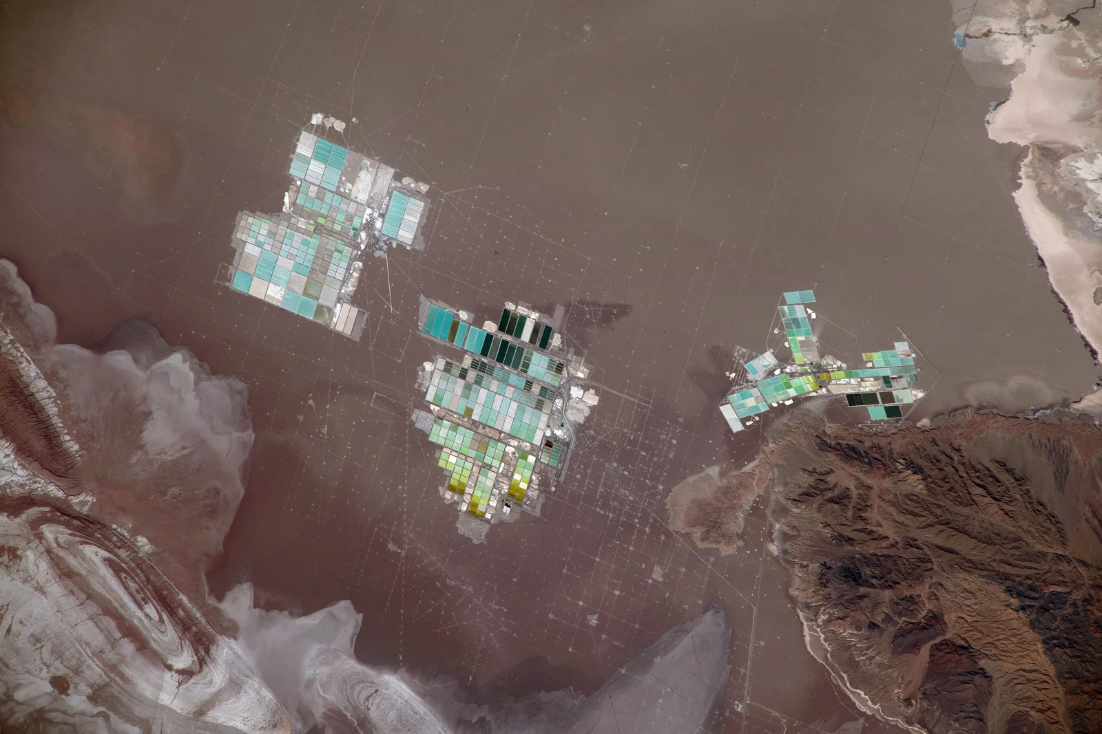 NASA astronaut photograph of salt evaporation ponds in Salar de Atacama, Chile